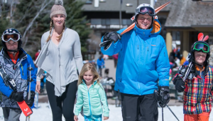 ski family walking in the snow